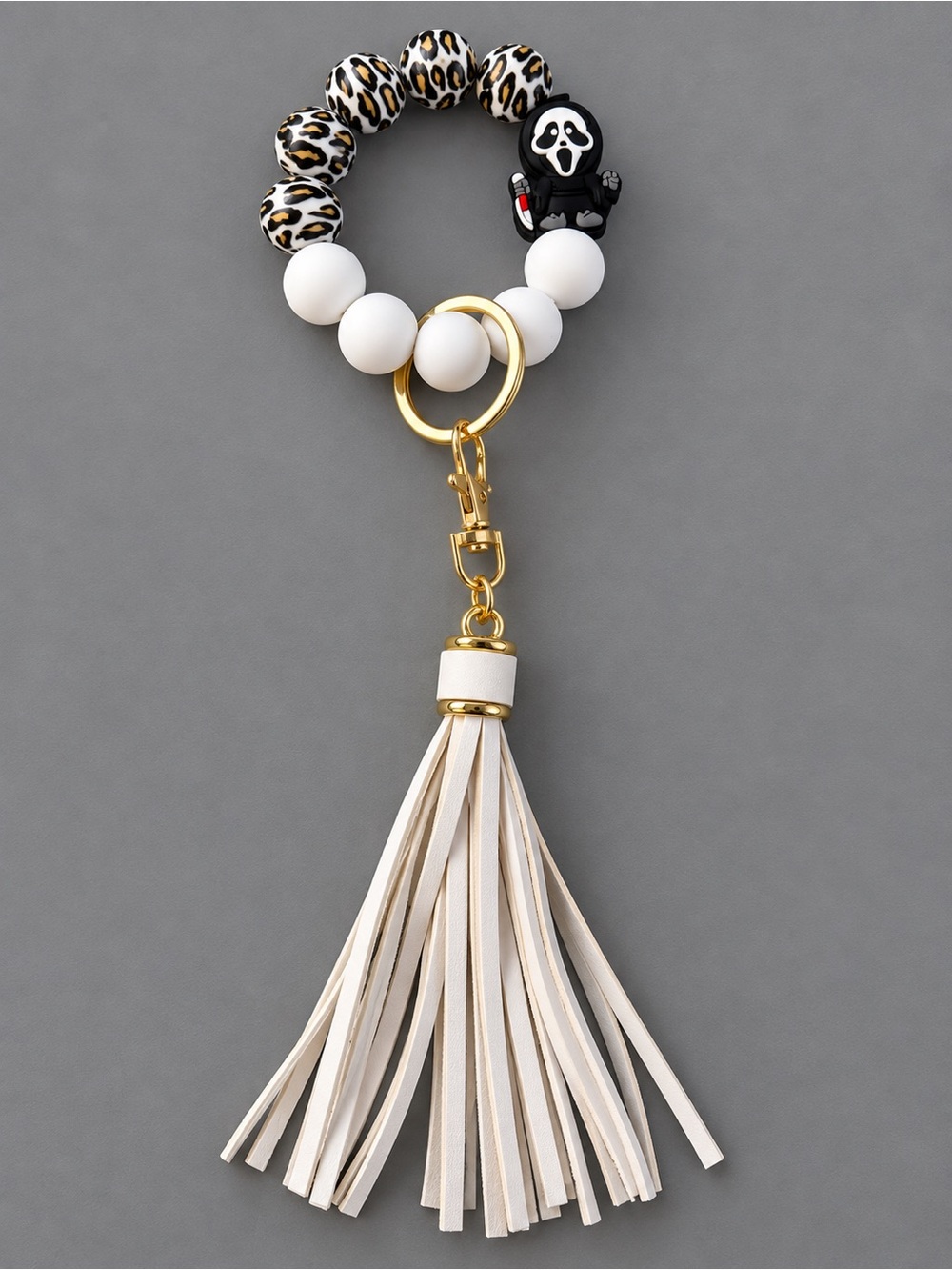 Ghost face themed …Leopard Beaded Wristlet Keychain with White Tassel